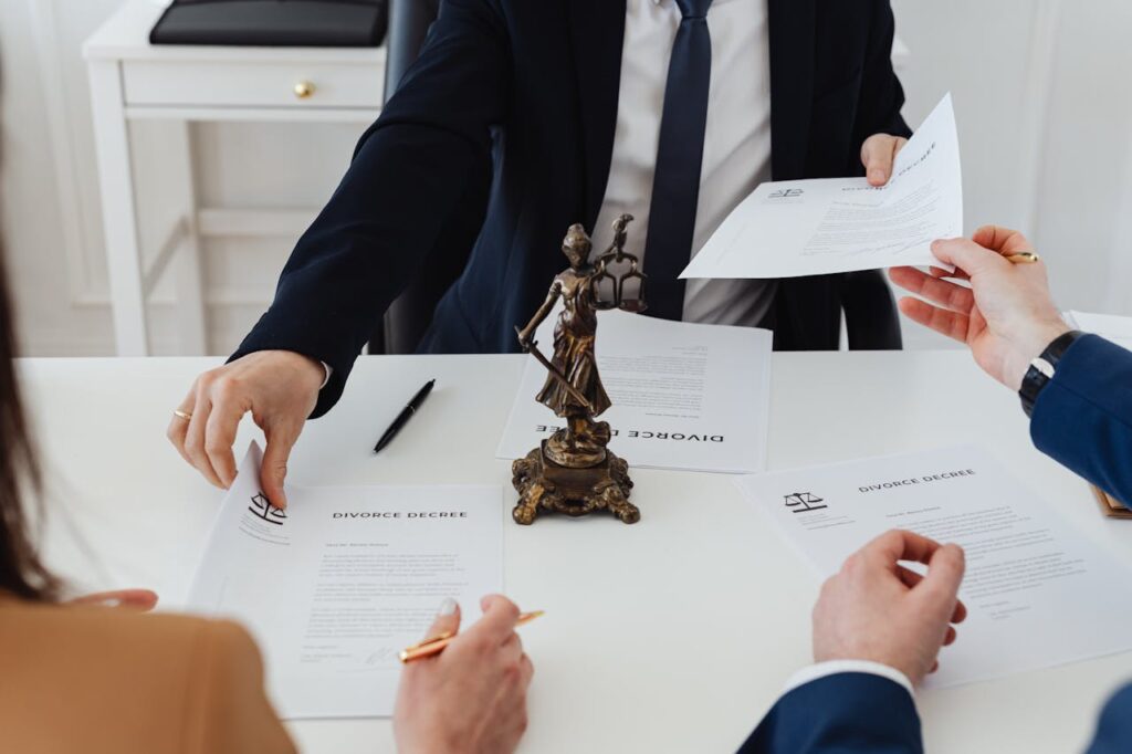 pexels-photo-7876051 People Holding Divorce Papers